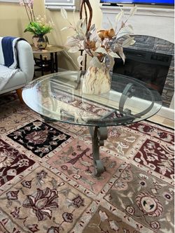 Glass and metal coffee table and one side table