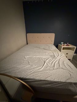 Full size mattress and bed frame.