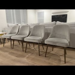 Upholstered west elm dining chairs