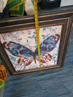 Pretty butterfly artwork with back hanger 31in wide 33in tall good condition