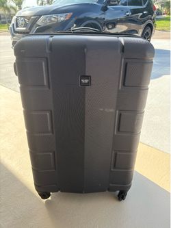 Grey Suitcase- Broken Wheel