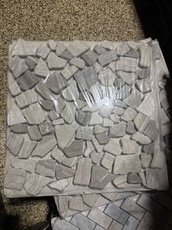 Pebble honed gray limestone floor and wall tile