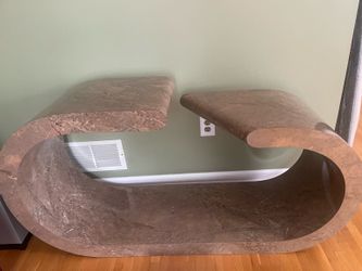 Modern sculptural coffee table .