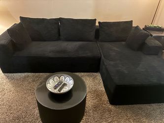 Black Sectional Sofa with Back Cushions