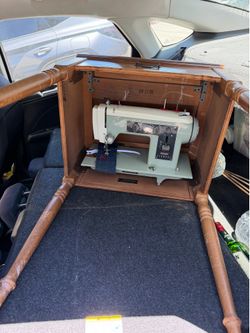 Cabinet sewing machine