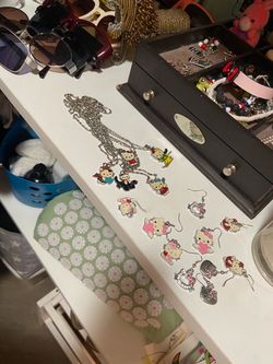 Hello Kitty Stainless Steel Earrings & Necklaces.