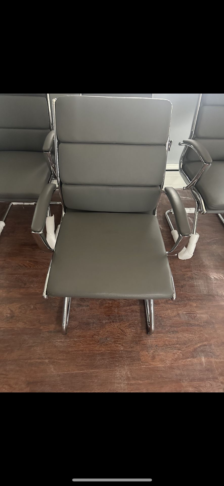 Merak collection sled base 4 Brand New guest chairs.