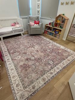 7x9 pink/purple no pile rug