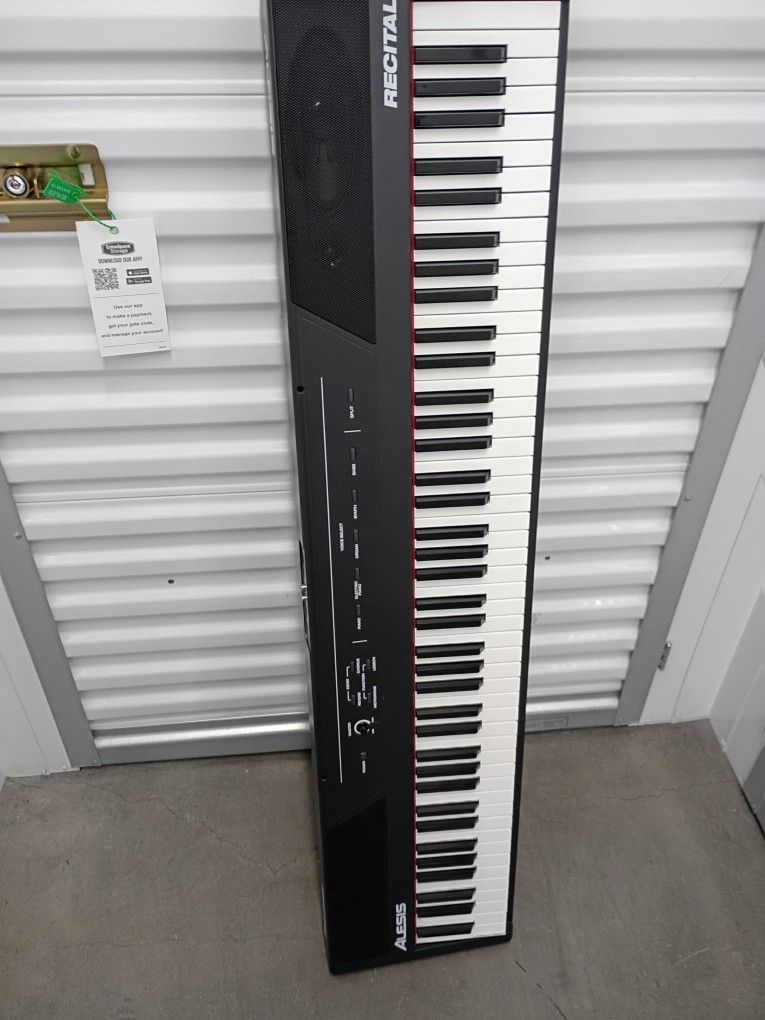 Alesis Recital Pro - 88 Key Digital Piano Keyboard with Hammer Action Weighted Keys, 2x20W Speakers, 12 Voices, Record and Lesson Mode, FX and Display