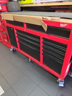 Milwaukee 61in TOOLBOX with sliding pegboard, flip down tray, power bar, soft closing drawers,New, minor scuffs, scratches, Financing available