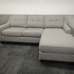 Free Delivery Today! Like new! 1 mo old Grey sectional couch with pullout bed. Reversible chaise . Cleaned!
