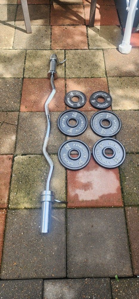 Olympic Curl Bar. Weight Plates