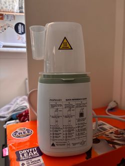 Momcozy bottle sterilizer and warmer