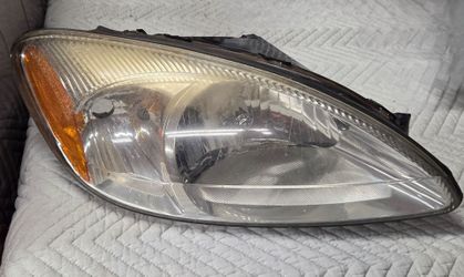 Headlight- Ford Taurus passenger side