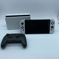 White OLED Nintendo Switch w/ Four (4) Joycons