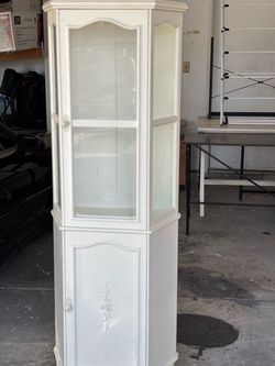 White glass display cabinet with storage