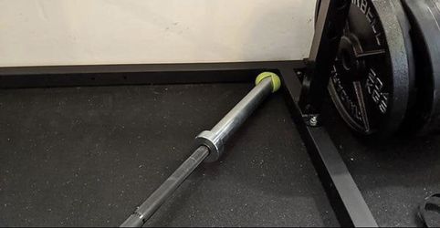 Tennis ball land mine for barbells