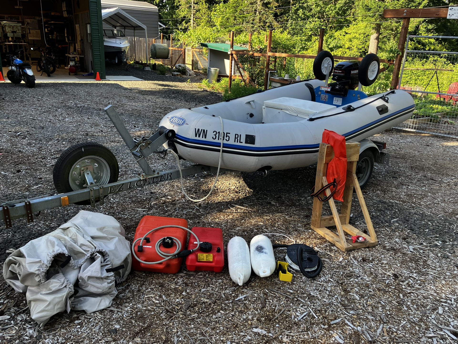 Zodiac Zoom, 15hp Mercury, EZ Loader trailer
