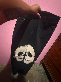 Men’s Black Baggy Jeans with Skull Patch