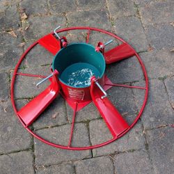 Christmas Tree Stand: Welded Metal Construction w/ Impact Grade Liner. Pick up in Haddon Heights. 