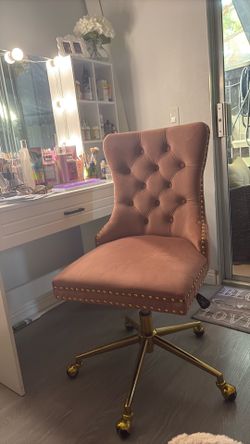 Pretty blush swivel chair