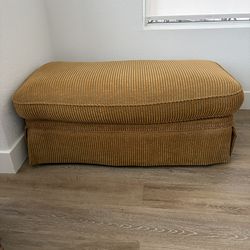 Set Of 2 Gold Rolling Ottomans