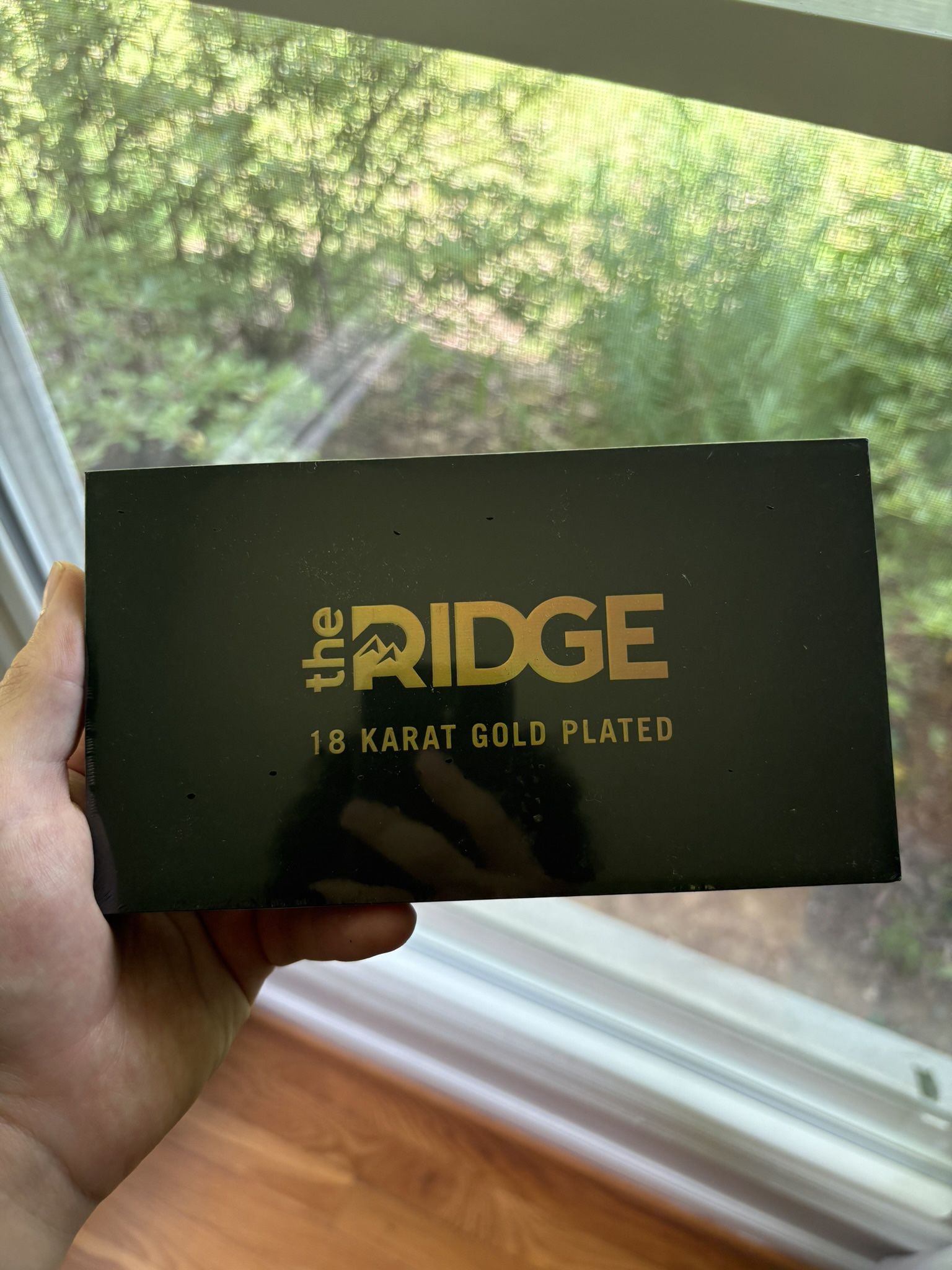 Sealed 18 Karat Gold Ridge Wallet 