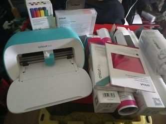 Cricut. Joy machine cutter and vinyl sheets