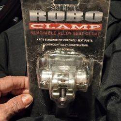New in package Odyssey Robo clamp - silver.