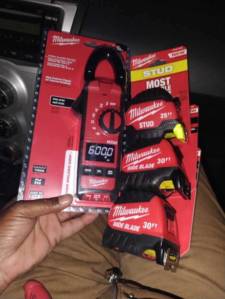 Both Milwaukee Measuring Tape And Milwaukee Voltage Meter Clamp 