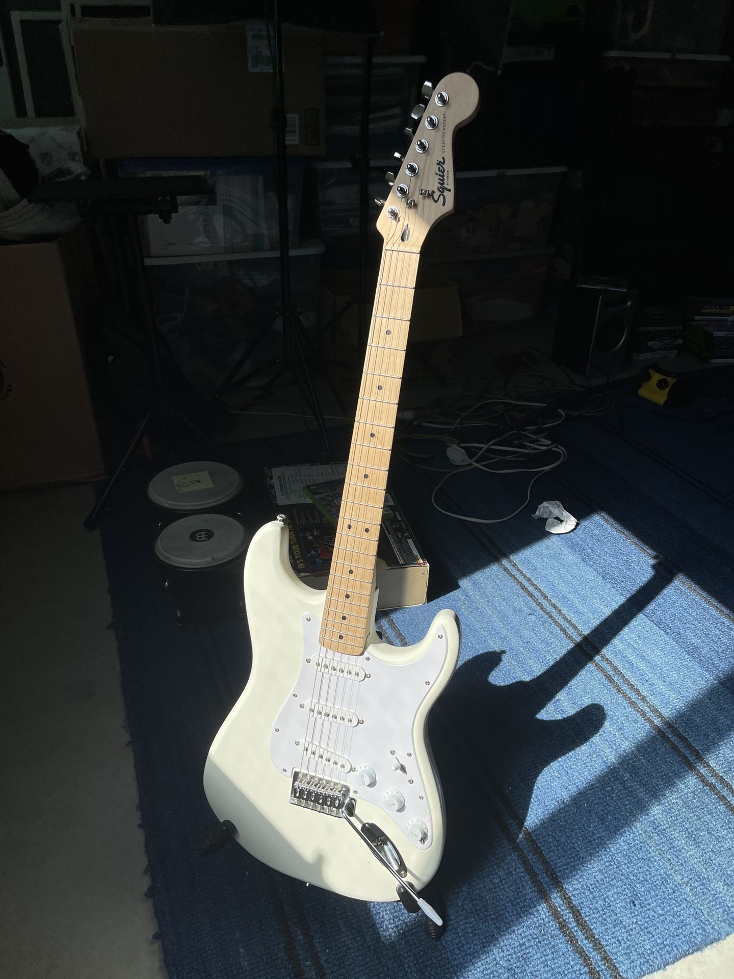 Squier Stratocaster (like new) white on white + guitar stand & guitar bag