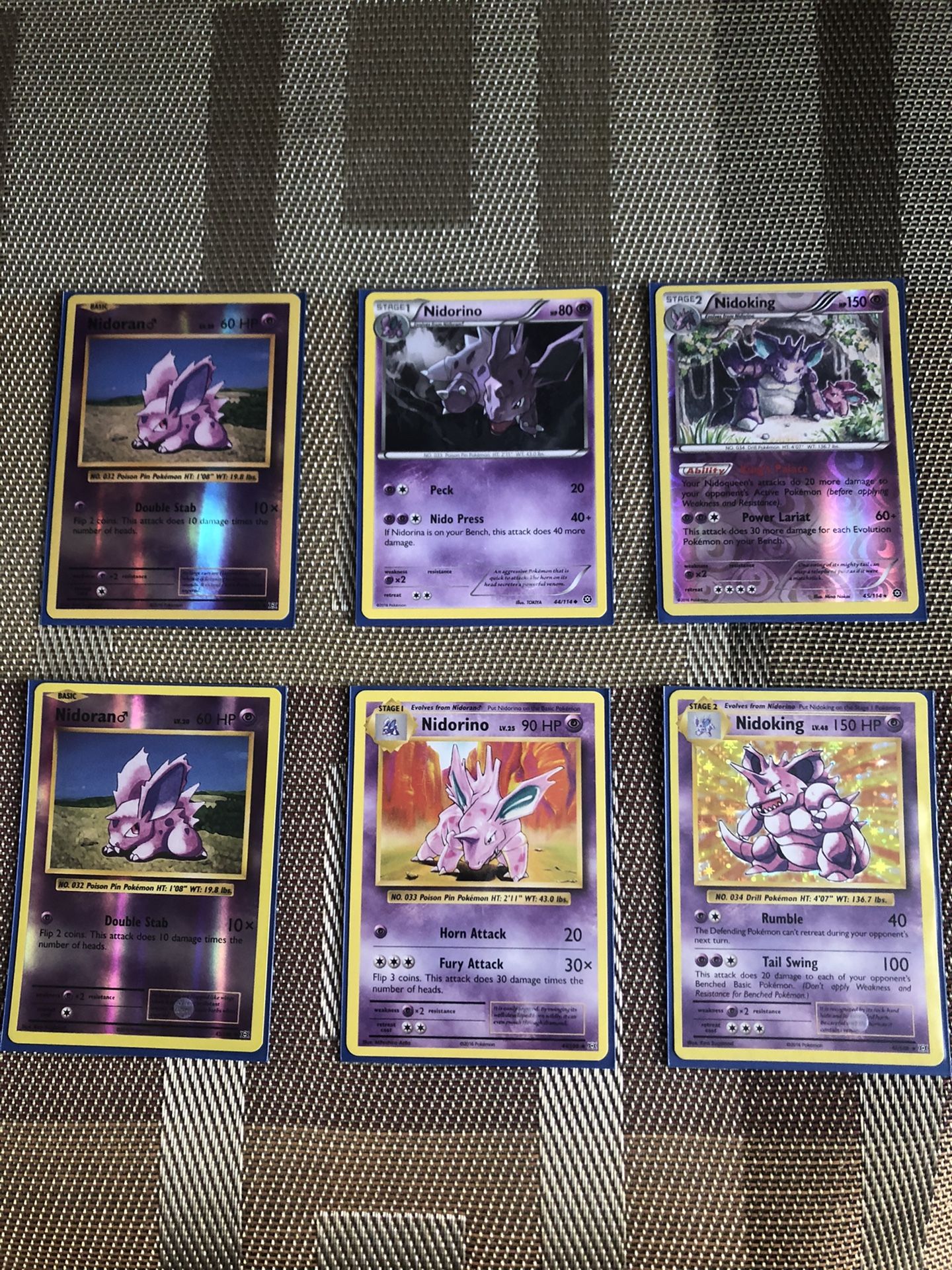 Pokemon cards (nidoran, nidorino , nidoking)