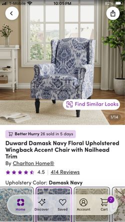 Floral upholstered wingback accent chair with nailhead trim
