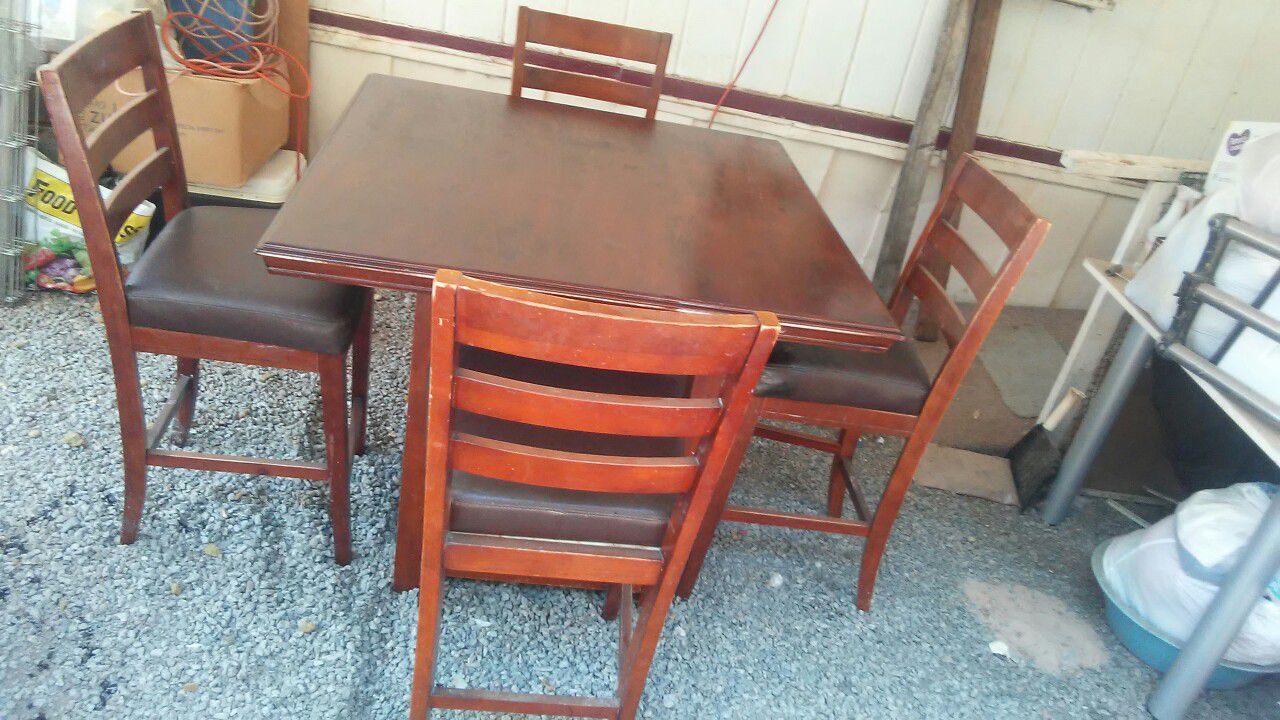 Pub table and 4 chairs