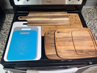 Cutting boards and 2 wood plates