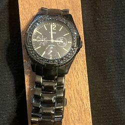 Guess Black Ion-Plated Steel GMT Ladies Watch (U13007L1) for sale! ✨   This elegant timepiece features a black ion-plated stainless steel case and bra