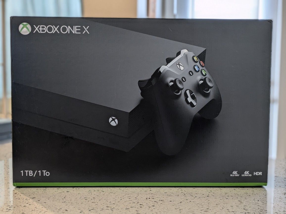 XBOX ONE X 1TB system and games