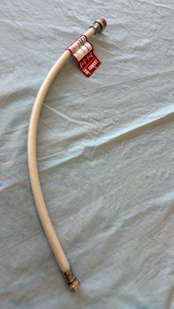 A Watts LBLK C20-68CP reinforced PVC faucet connector