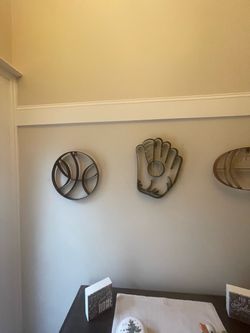 THREE WROUGHT IRON SPORTS WALL DECOR