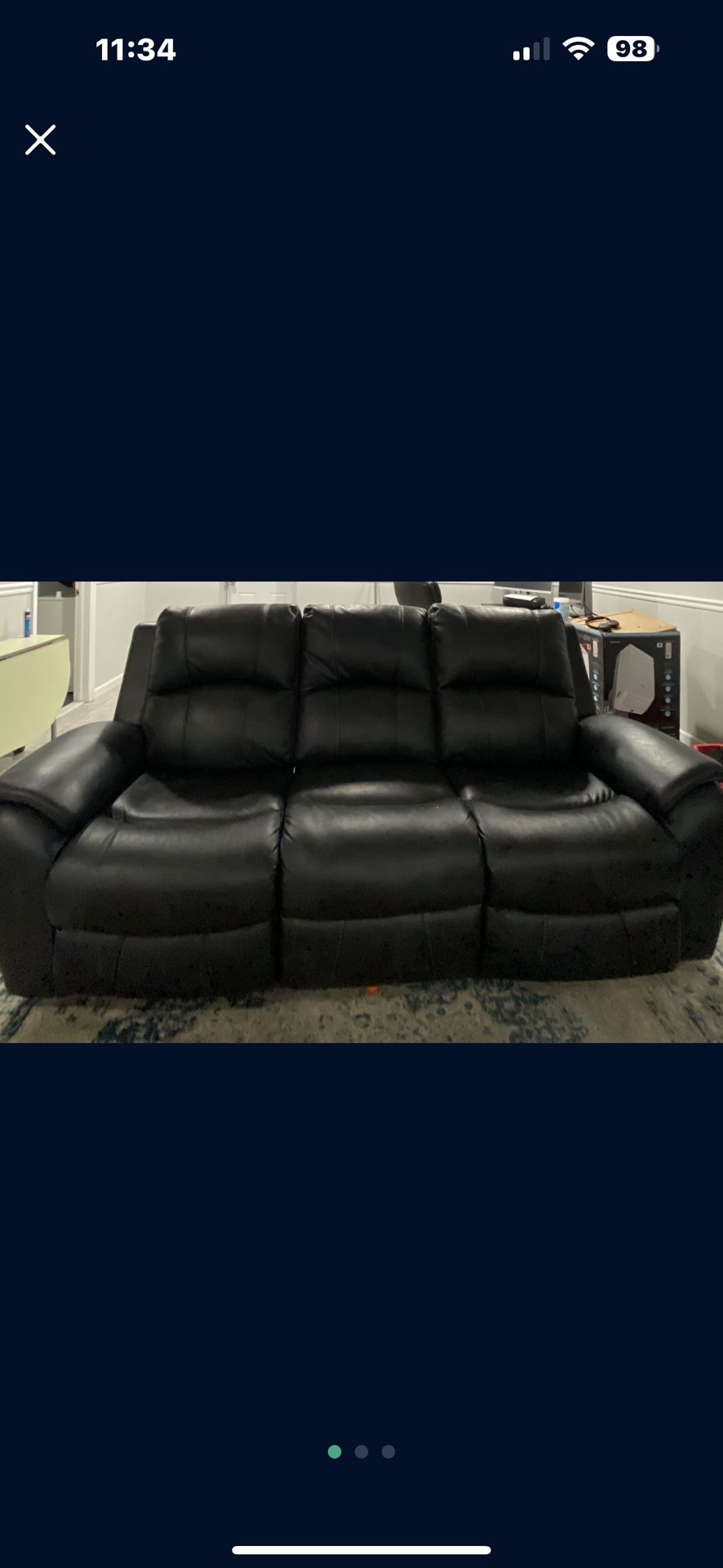 Leather Reclining sofa in charcoal leather. Gotham series