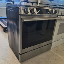 New  - 6.3 Cu. Ft. Slide-In Electric True Convection Smart Range with Air Fry and 2 UltraHeat Ele