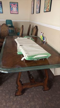 Table with chairs two set of seven chairs pick one or take both