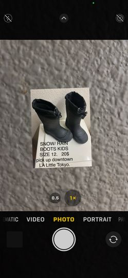 Kamik NICE snow boots with insulation or can also be used as a rain boots kids size 12