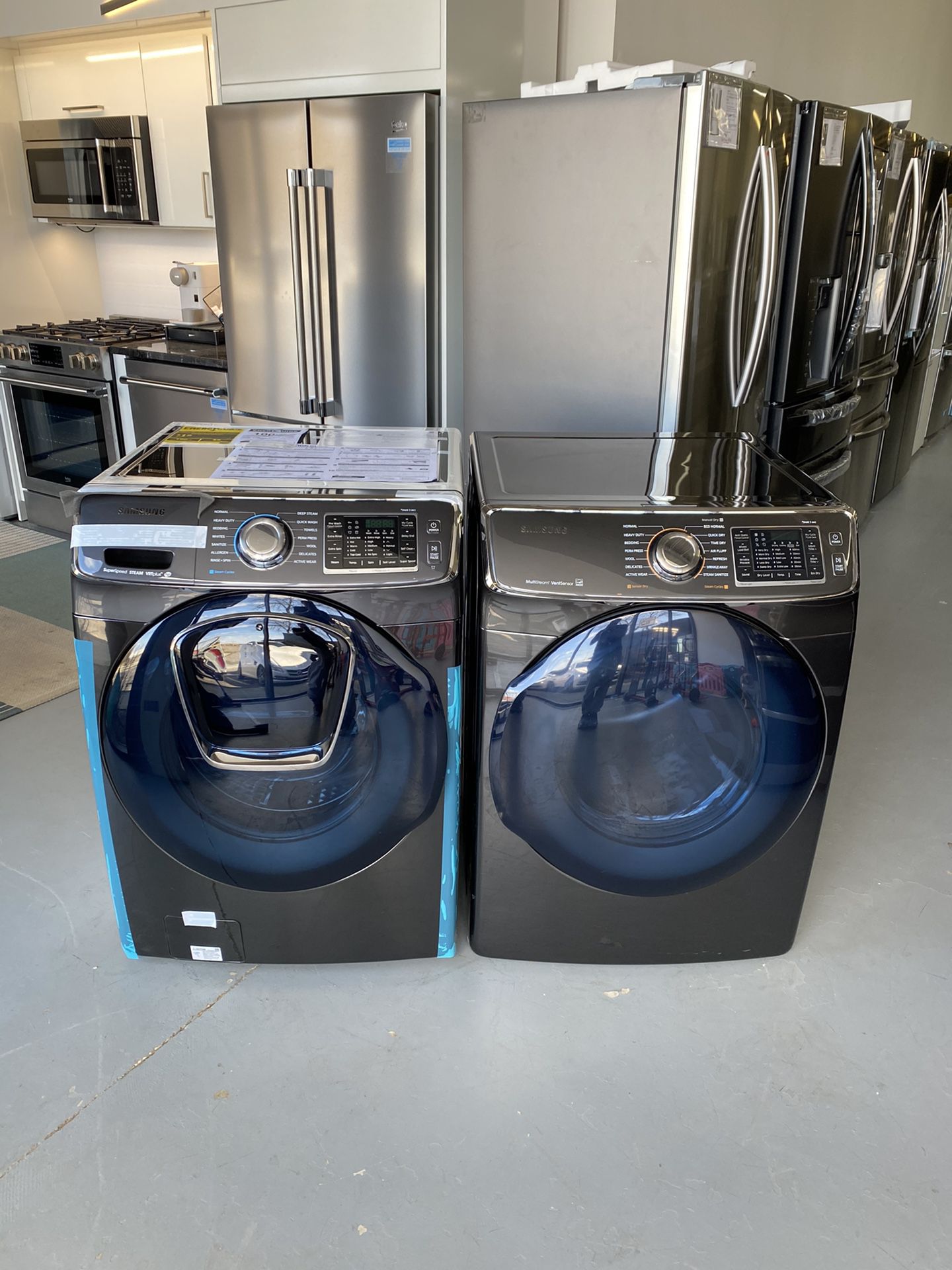 NEW Samsung front loading washer and electric dryer set!
