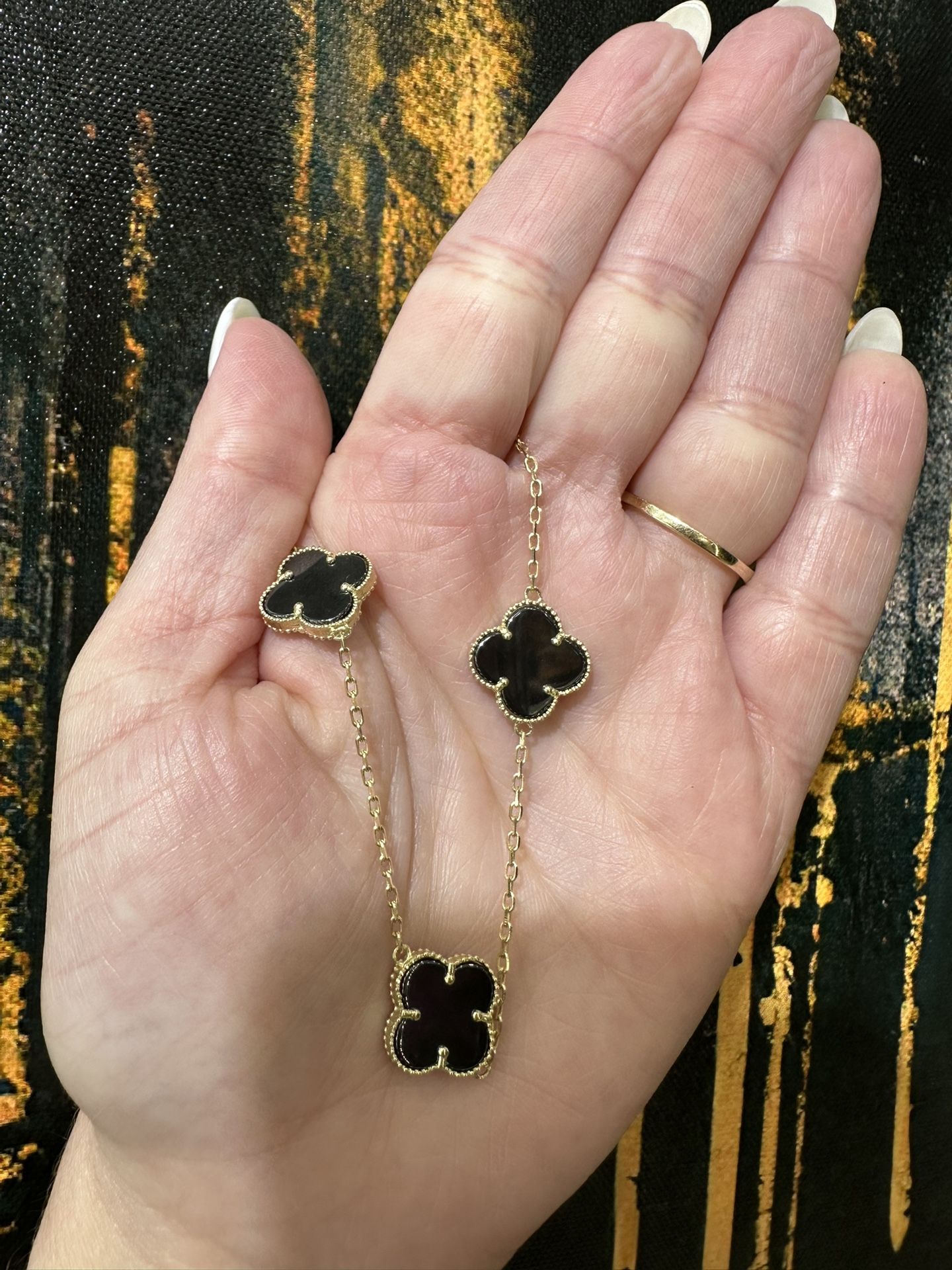 10k BLACK FLOWER BRACELET