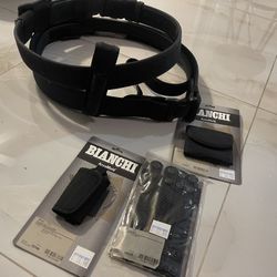Two Security Belts And Accessories 