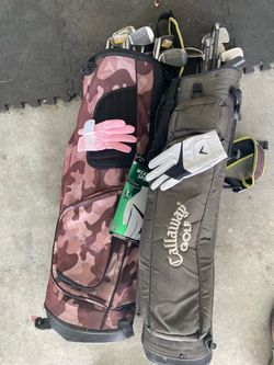 2 Golf Bags w irons included . Plus free men’s and woman’s golf gloves