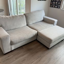 Sofa plus ottoman.