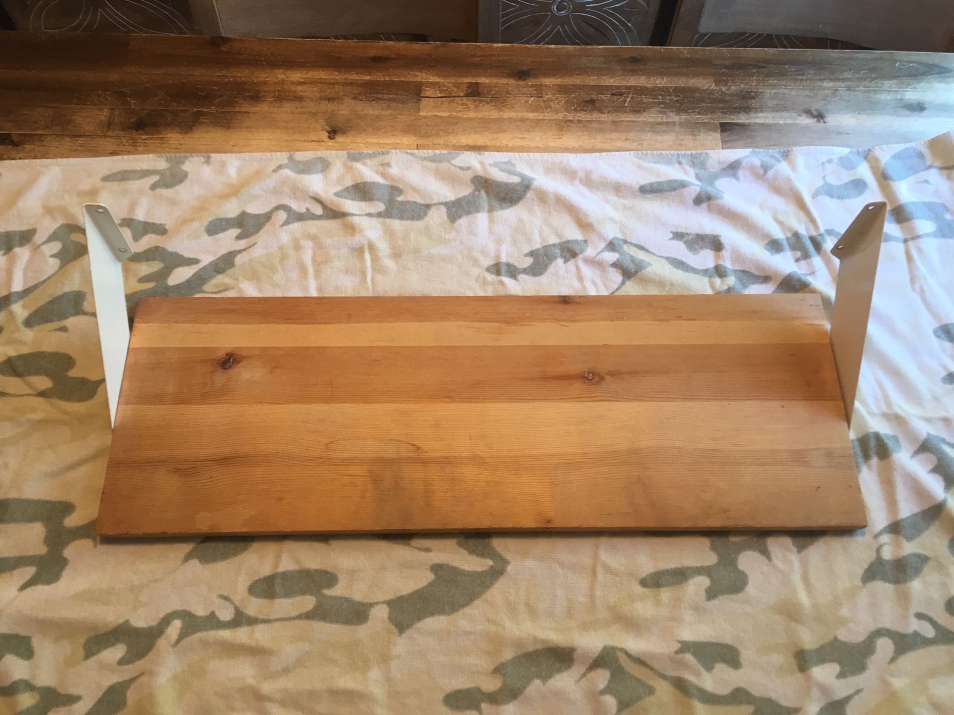 For wall shelves – pine with white brackets - 27 1/2 x 9 1/2” - five dollars each