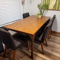 Nice wood dining table with fabric chairs